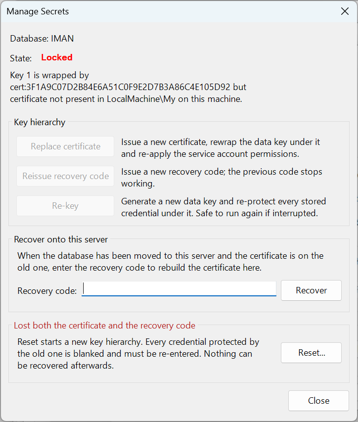 The Manage Secrets window for database IMAN in the Locked state. The detail reads "Key 1 is wrapped by cert:3F1A…5D92 but certificate not present in LocalMachine\My on this machine." The Key hierarchy buttons are unavailable. The Recovery code box and the Recover button are available, and so is Reset...