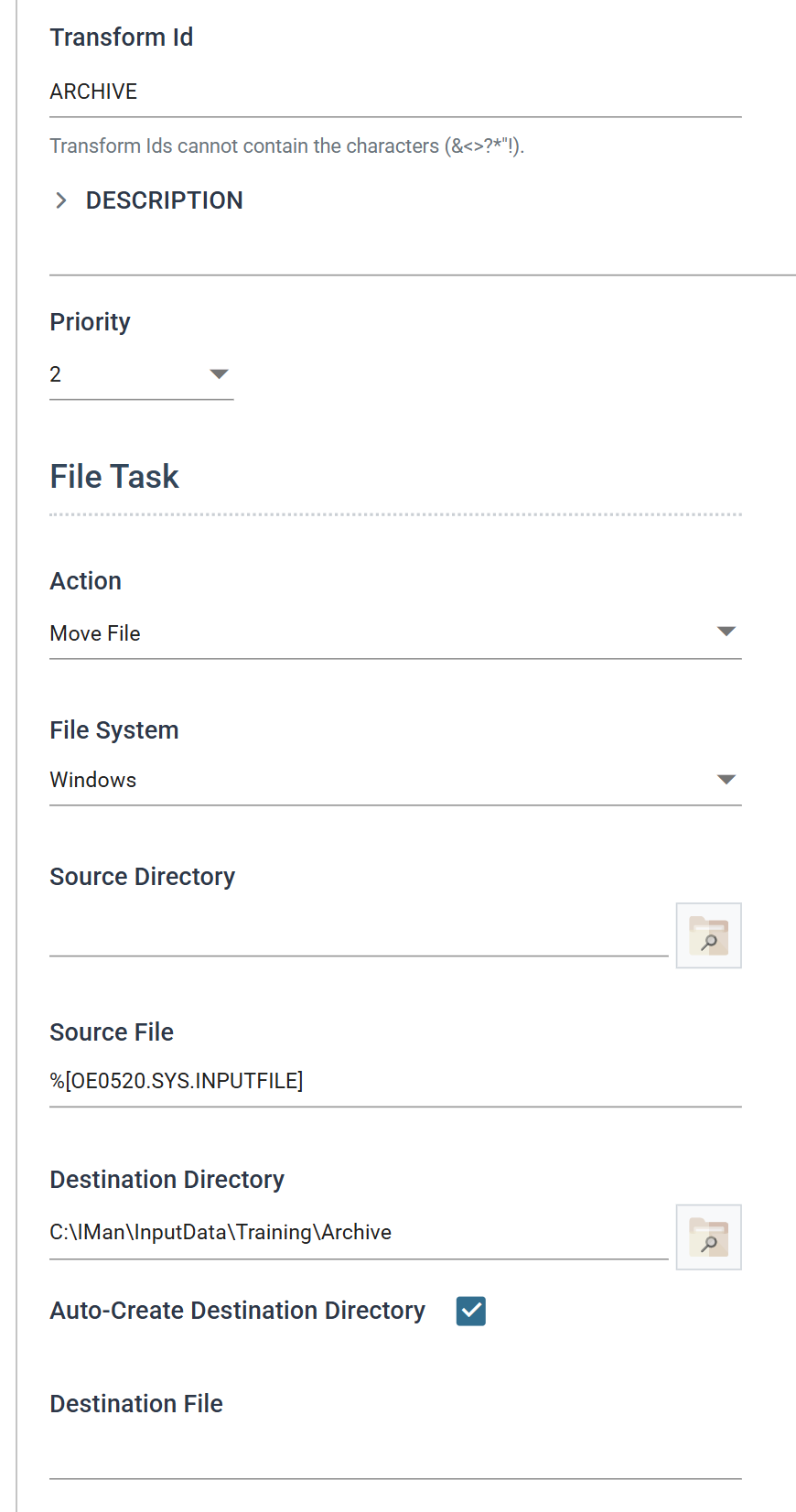 The File task's Setup tab with Source Directory empty and Source File set to the OE0520.SYS.INPUTFILE field reference