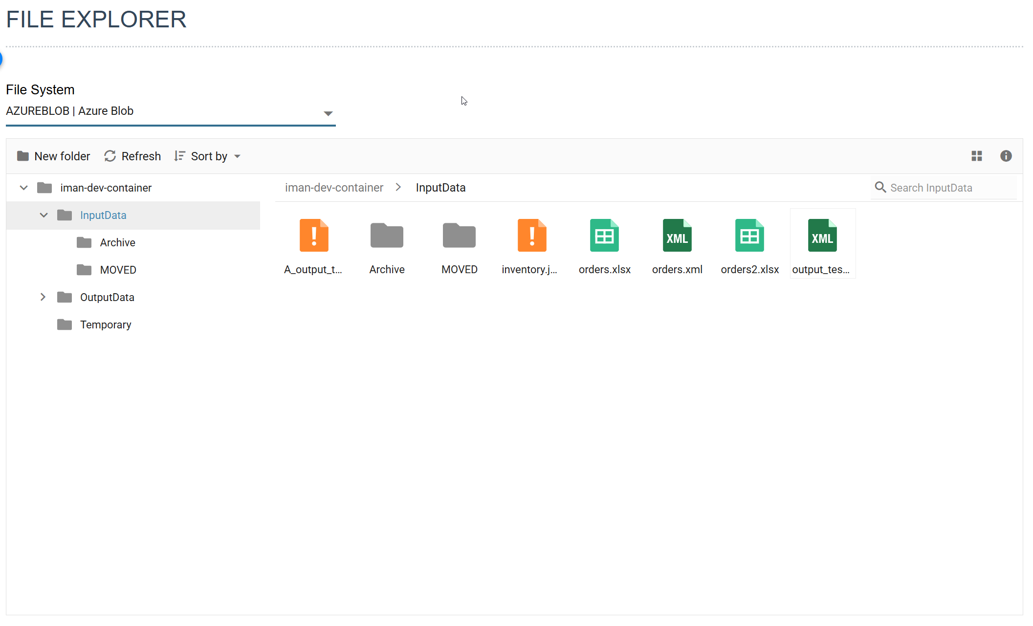 The File Explorer on the AZUREBLOB file system, with the container's folders in a tree on the left and the InputData folder's files on the right